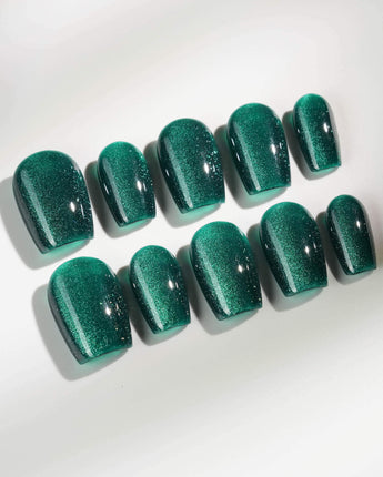 Emerald Green Nail Designs Cat-eye Nails press-on nails in extra short coffin shape — emerald green cat eye nails