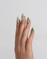 Emerald Wild press-on nails in short almond shape — Mori Monet's Garden, Hand-painted Forest Fairies & 3D Water Droplets.