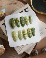 Emerald Wild press-on nails in medium almond shape — Mori Monet's Garden, Hand-painted Forest Fairies & 3D Water Droplets.