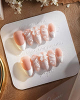 Engagement press-on nails in short almond shape — Elegant Style, Pearl Outlines & 3D Ribbon Bows.