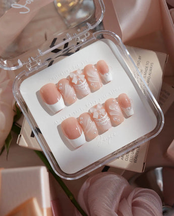 Engagement press-on nails in short coffin shape — Elegant Style, Pearl Outlines & 3D Ribbon Bows.