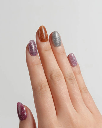 Euphoria nail art close-up showing Vibrant Multicolor Reflective Glitter, Minimalist Solid Color Skittles Style. details