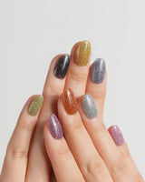 Euphoria handmade press-on nails featuring Vibrant Multicolor Reflective Glitter, Minimalist Solid Color Skittles Style.