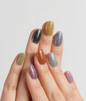 Euphoria handmade press-on nails featuring Vibrant Multicolor Reflective Glitter, Minimalist Solid Color Skittles Style.