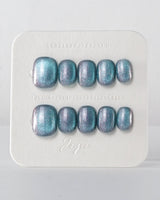 Spinning Aurora nails in extra short squoval — Gradient Duo-chrome Cat-eye with