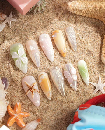 Close-up of Fairy Bay showing 3D starfish, delicate butterflies, and pastel sea-breeze colors