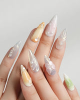 Fairy Bay handmade ocean nails with soft florals, butterfly details, and starfish accents