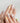 Nude nail with pastel jellyfish and sculpted shimmer	