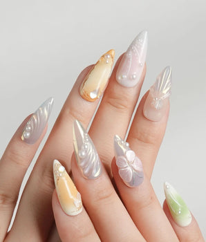 Fairy Bay handmade ocean nails with soft florals, butterfly details, and starfish accents