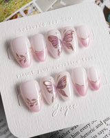 Fairy Wings nail art close-up showing Ethereal Pink & Purple, Hand-painted Metallic Butterflies & French Gradient. details