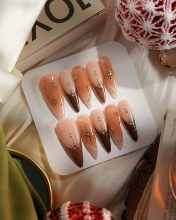 Fall Makeup nails with caramel gradient polish, 3D gold wire details, and gem accents