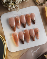 Fall Makeup press-ons with warm brown French gradient, gold stars, and tiny crystals