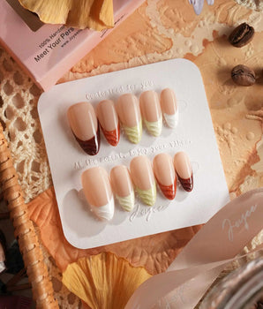 Fall Palette nail set with earthy fall colors, raised texture, and glossy French tip styling