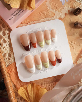 Fall Palette nail set with earthy fall colors, raised texture, and glossy French tip styling
