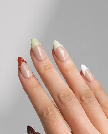 Fall Palette in medium almond shape with warm multicolor French tips and fall gel texture