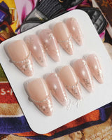 Falling Sakura-Gold press-ons with champagne pink shimmer and scattered gold floral details