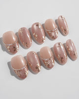 Falling Sakura-Gold nail set with champagne cat-eye glow and delicate gold sakura petals