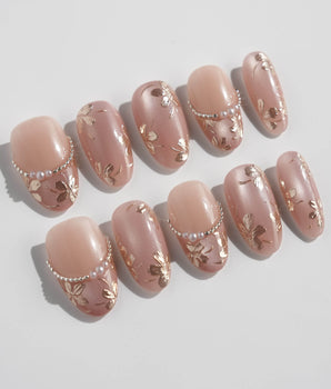 Falling Sakura-Gold nail set with champagne cat-eye glow and delicate gold sakura petals