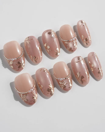 Falling Sakura-Gold nail set with champagne cat-eye glow and delicate gold sakura petals