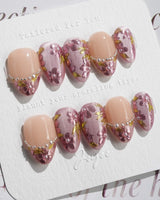 Falling Sakura press-on nails in extra short almond shape — Elegant Rosy Mauve, Hand-painted Blooms & Pearls.