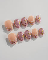 Falling Sakura press-on nails in extra short oval shape — Elegant Rosy Mauve, Hand-painted Blooms & Pearls.