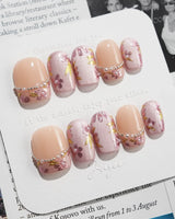 Falling Sakura press-on nails in extra short square shape — Elegant Rosy Mauve, Hand-painted Blooms & Pearls.