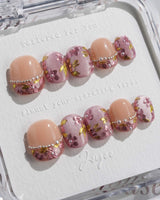 Falling Sakura press-on nails in extra short squoval shape — Elegant Rosy Mauve, Hand-painted Blooms & Pearls.