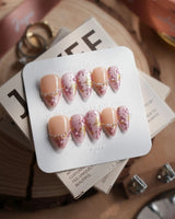 Falling Sakura press-on nails in short stiletto shape — Elegant Rosy Mauve, Hand-painted Blooms & Pearls.
