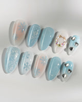 Winter wonderland press-on nails — Icy Blue Snowflakes, Rhinestone Wreath & Hearts. handmade nail art by Joyee Nails