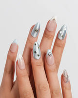 FIFA Argentina medium almond nails with celestial gold lines and soccer charms