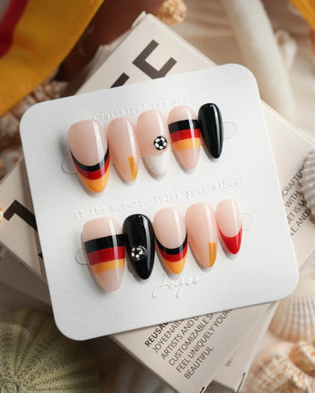 FIFA Germany custom size press-ons with black red gold stripes and soccer ball nail art