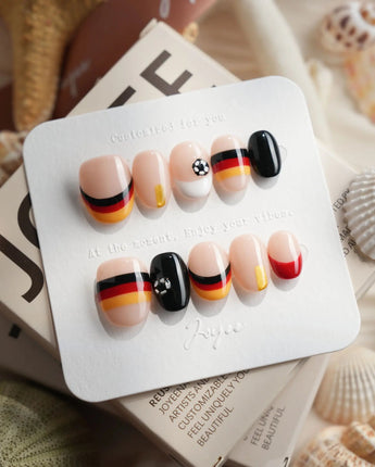 FIFA Germany extra short oval nails with graphic soccer flag stripe accents