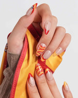 FIFA Spain short almond nails with red yellow wave accents and gold star details