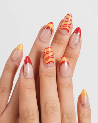 FIFA Spain game day press-ons with hand-painted flag colors and soccer ball nail charms