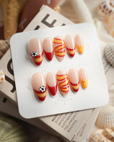 FIFA Spain medium almond nails with red and gold World Cup 2026 soccer design