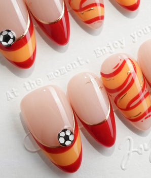 FIFA Spain handmade World Cup nails with 3D soccer ball charms and La Roja colors