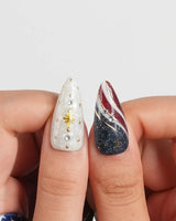 FIFA USA maximalist patriotic nails with glitter stars, soccer charms, and USA lettering