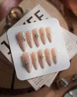 First Flake nails in medium stiletto — Icy Milky White &