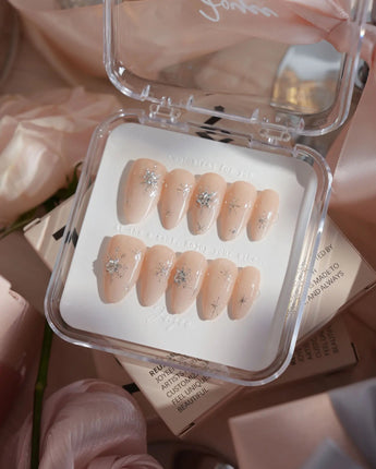 First Flake nails in short almond — Icy Milky White &