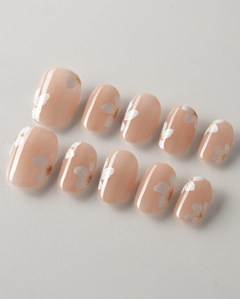 Fleur Fantasy press-on nails in extra short oval shape — white floral french tip nails