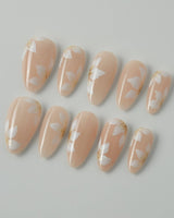 Fleur Fantasy press-on nails in medium almond shape — white floral french tip nails