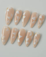 Fleur Fantasy press-on nails in medium stiletto shape — white floral french tip nails