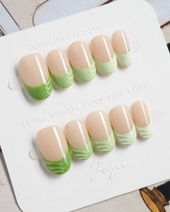 Forest Layers press-on nails in short oval shape — Nude Pink & Green, 3D Textured French.