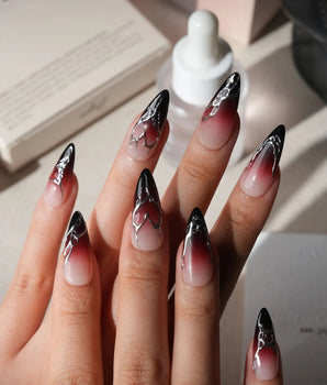 Fracture press on nails with sculpted mirror silver cracks over a nude to wine red to black gradient - image 2