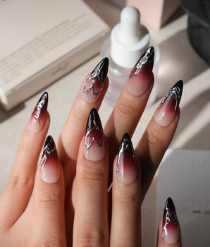 Fracture press on nails with sculpted mirror silver cracks over a nude to wine red to black gradient - image 2