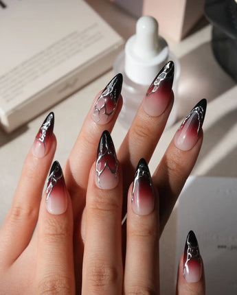 Fracture press on nails with sculpted mirror silver cracks over a nude to wine red to black gradient - image 2