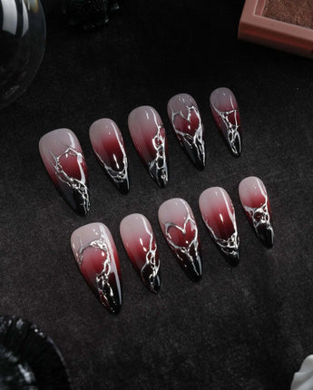 Fracture press on nails with sculpted mirror silver cracks over a nude to wine red to black gradient - image 3