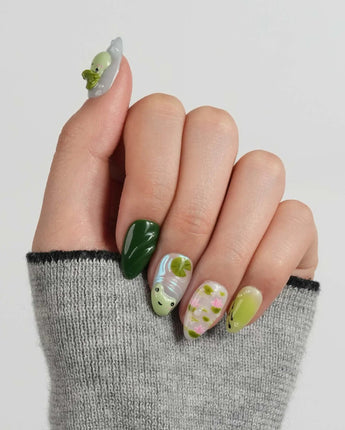 Frog Dodo glossy pond nail set with 3D frog details and pistachio green base