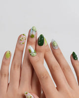 Frog Dodo natural summer nail art with sculpted frogs peeking through pond leaves
