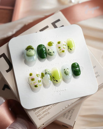 Frog Dodo pond press-on nails in extra short oval shape
